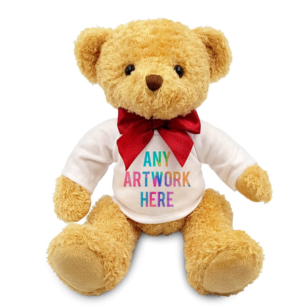 A promotional soft toy teddy bear with printed white t-shirt and a red ribbon. The toy is made of high-quality materials and is perfect for children and adults alike